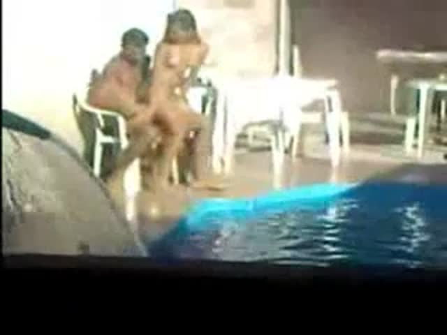 Voyeur spies on couple fucking by the pool at HomeMoviesTube